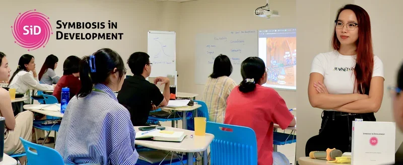 A team mapping a systems diagram in a real SiD Vietnam training workshop